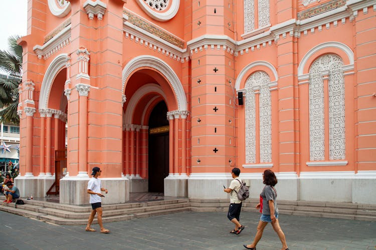 People Walking Near Tan Dinh Church In Ho Chi Minh In Vietnam