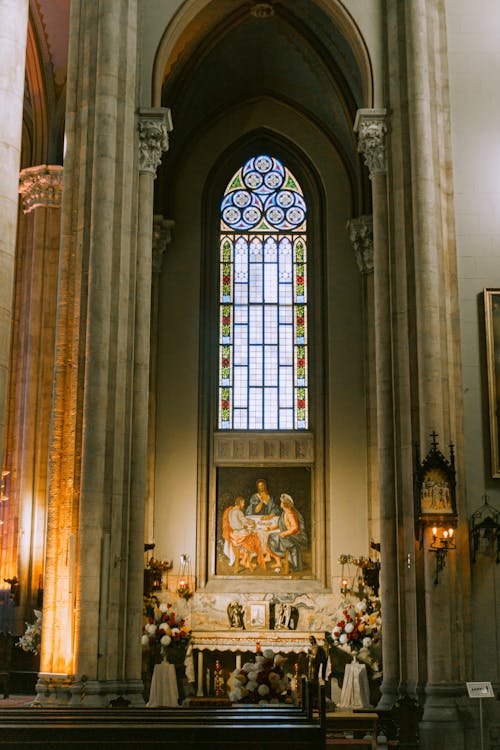 Catholic Church Interior with a Religious Painting on the Altar 