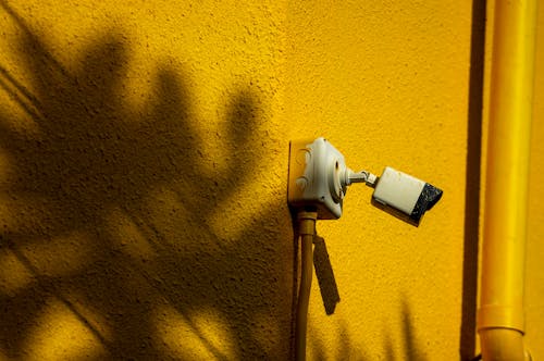 A stock photo of a CCTV (Closed Circuit Television) typically features an image or illustration related to surveillance, security, or monitoring systems. This type of image could include