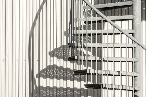 Steel Spiral Stairs by Wall