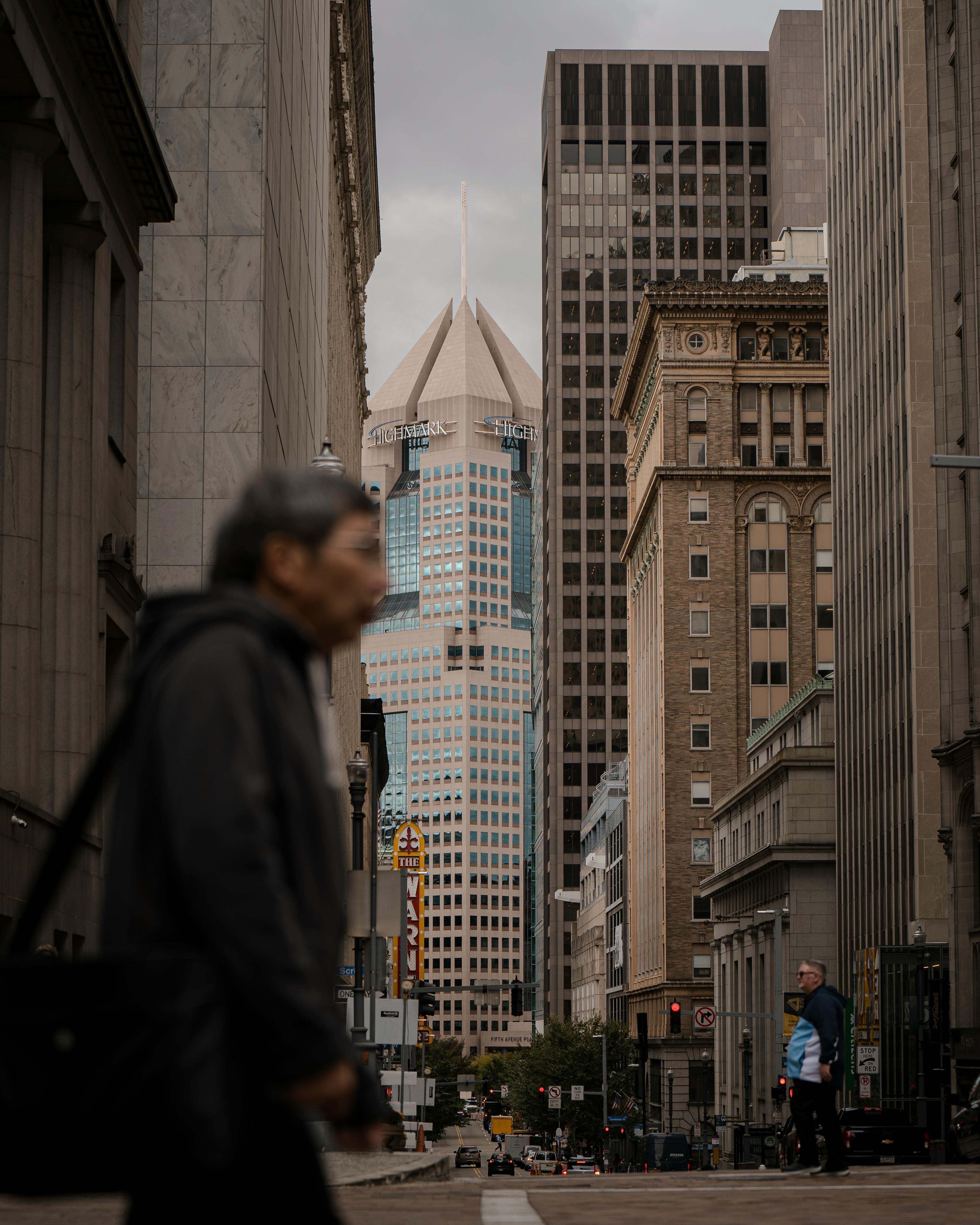 Explore the dynamic urban architecture and streets of downtown Pittsburgh, showcasing iconic skyscrapers and city life.