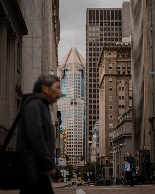 Explore the dynamic urban architecture and streets of downtown Pittsburgh, showcasing iconic skyscrapers and city life.