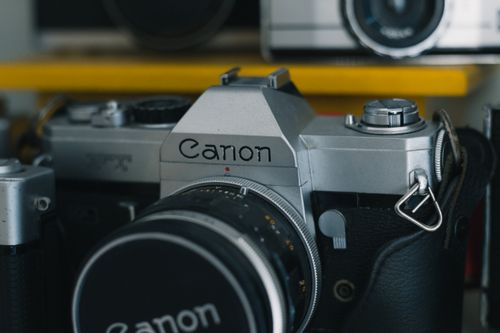 Free Detailed close-up of a classic vintage Canon camera displaying its timeless design. Stock Photo