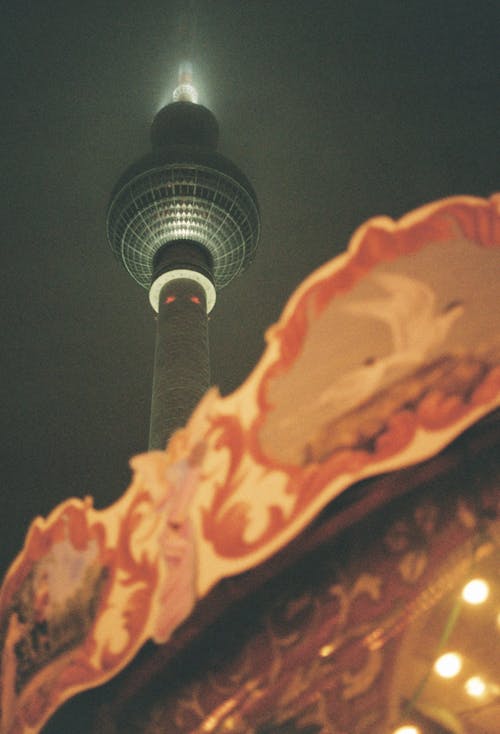 Free Carousel Under a Tower in Berlin  Stock Photo