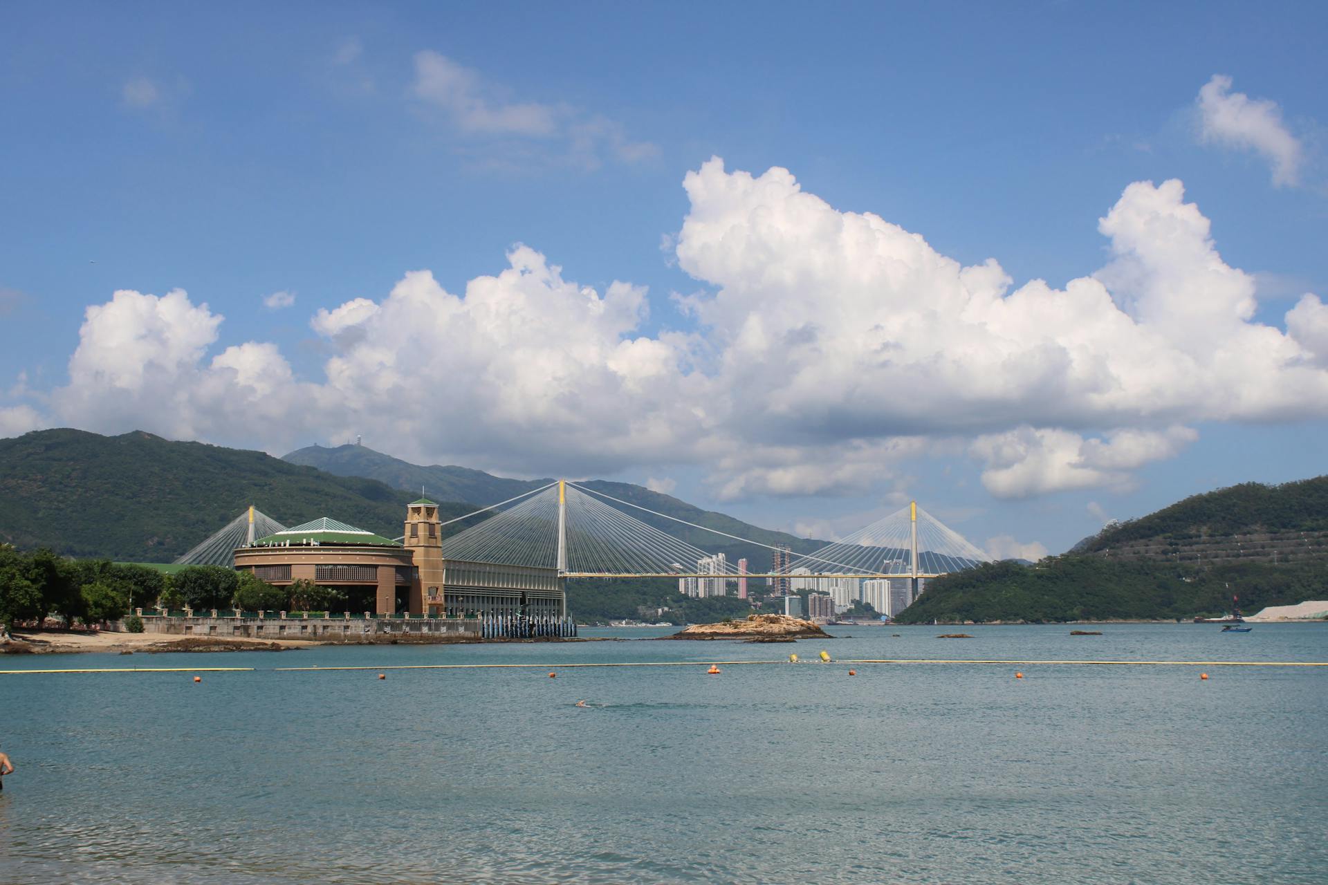 Beautiful view of Tsing Ma Bridge over Ma Wan Channel in Hong Kong, clear skies.