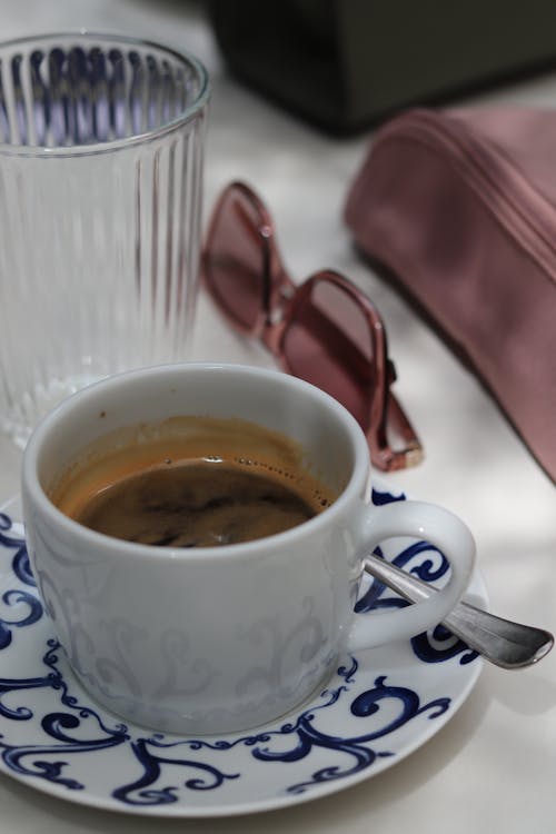 Cup of Black Coffee Served in a Restaurant 