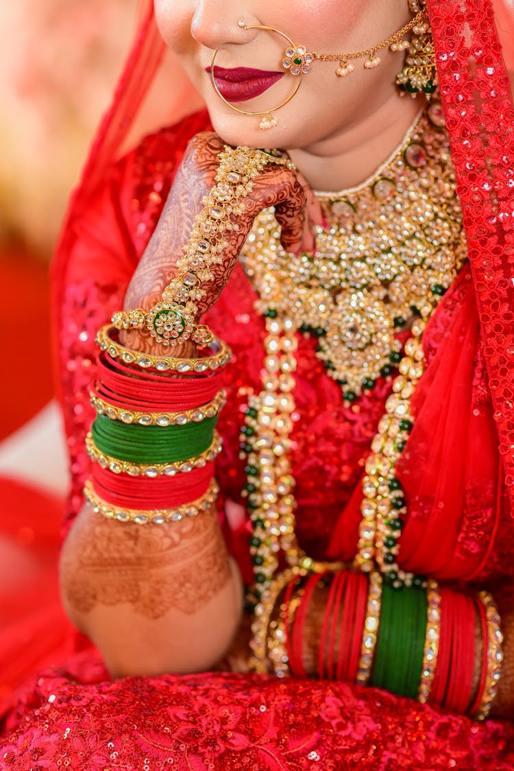 Jewelry And Traditional Henna Tattoos On The Bride Hand