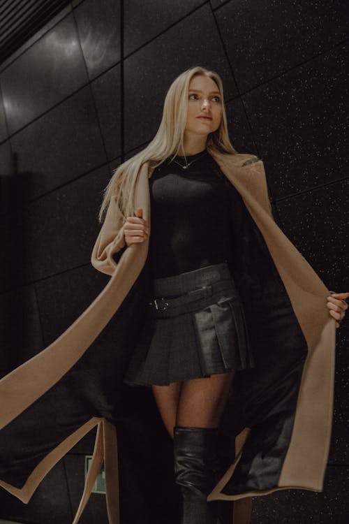 Blonde Woman in Coat and Skirt