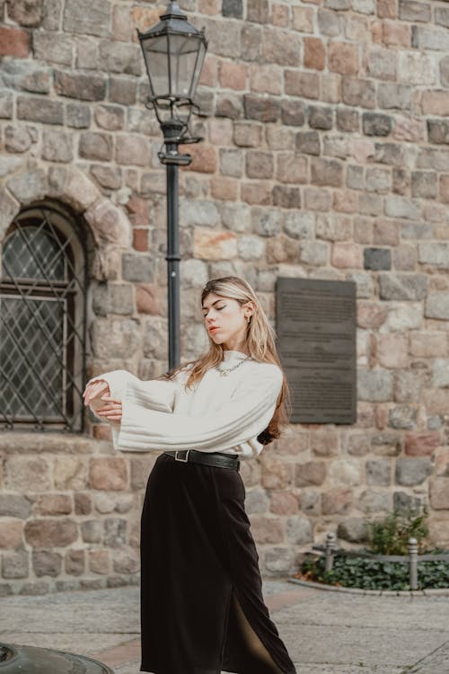 Blonde Woman in Whtie Sweater