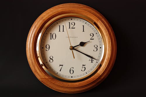 Brown Wooden Framed Clock Showing 2:19