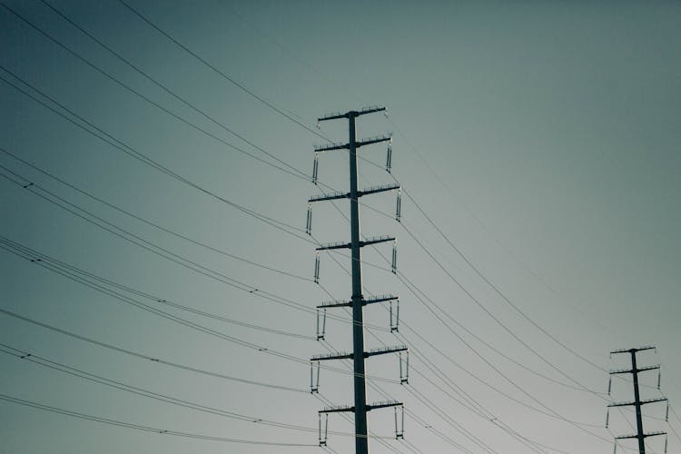 Electricity Pylons In The Evening