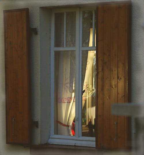 Window with Wooden Shutters 