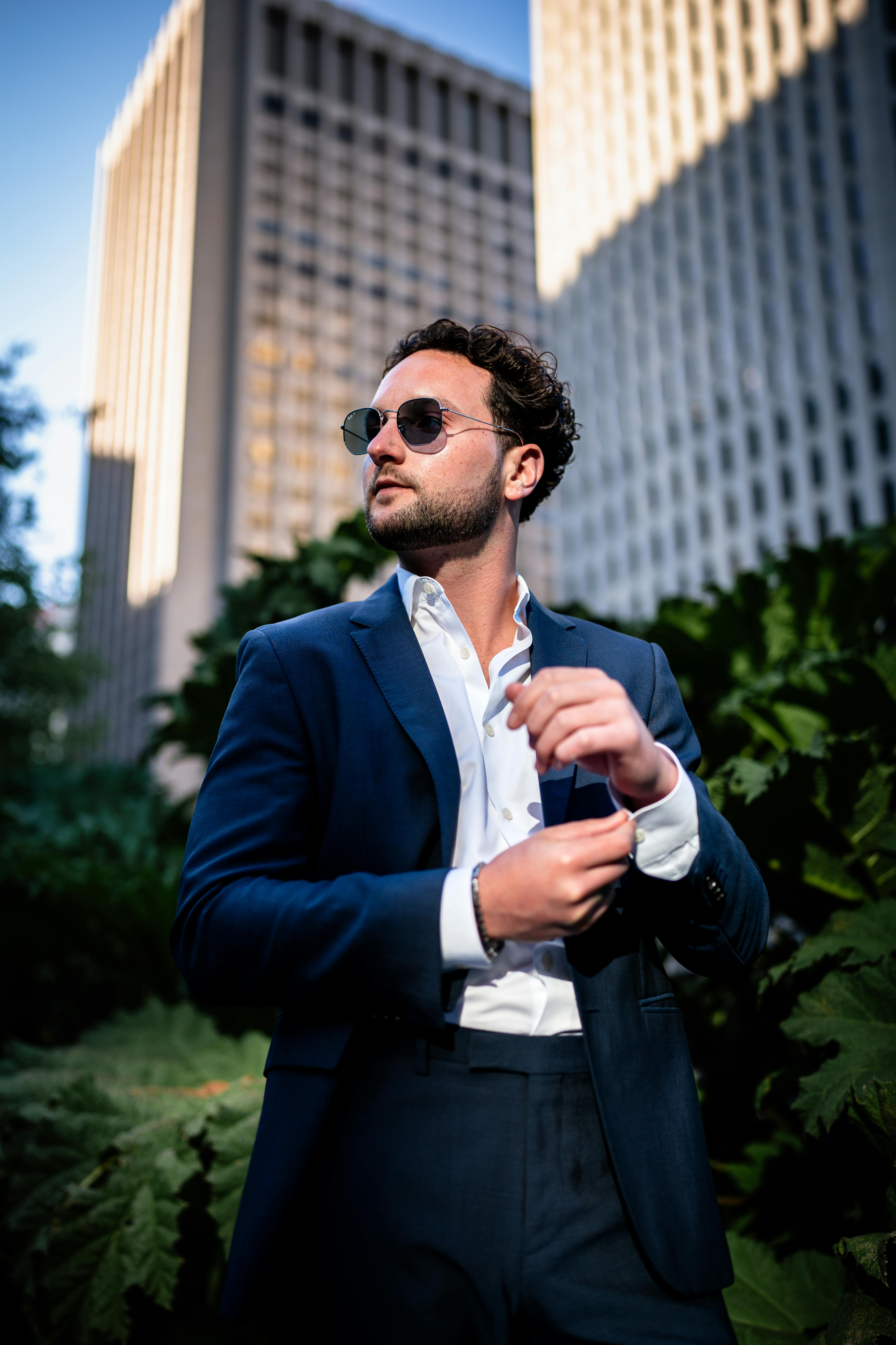 Portrait of Man in Suit and Sunglasses Free Stock Photo