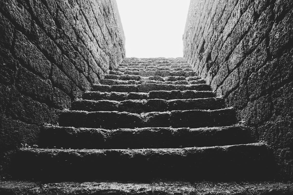 Free Low Angle Grayscale Photo of Empty Brick Stairs Stock Photo