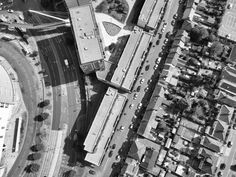 Black and white aerial view of roads and buildings in Hertfordshire, England.
