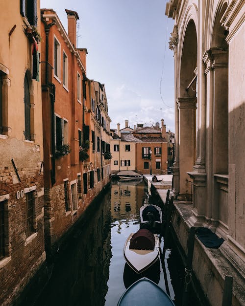 Boats Moored in a Narrow Canal, Venice, Italy