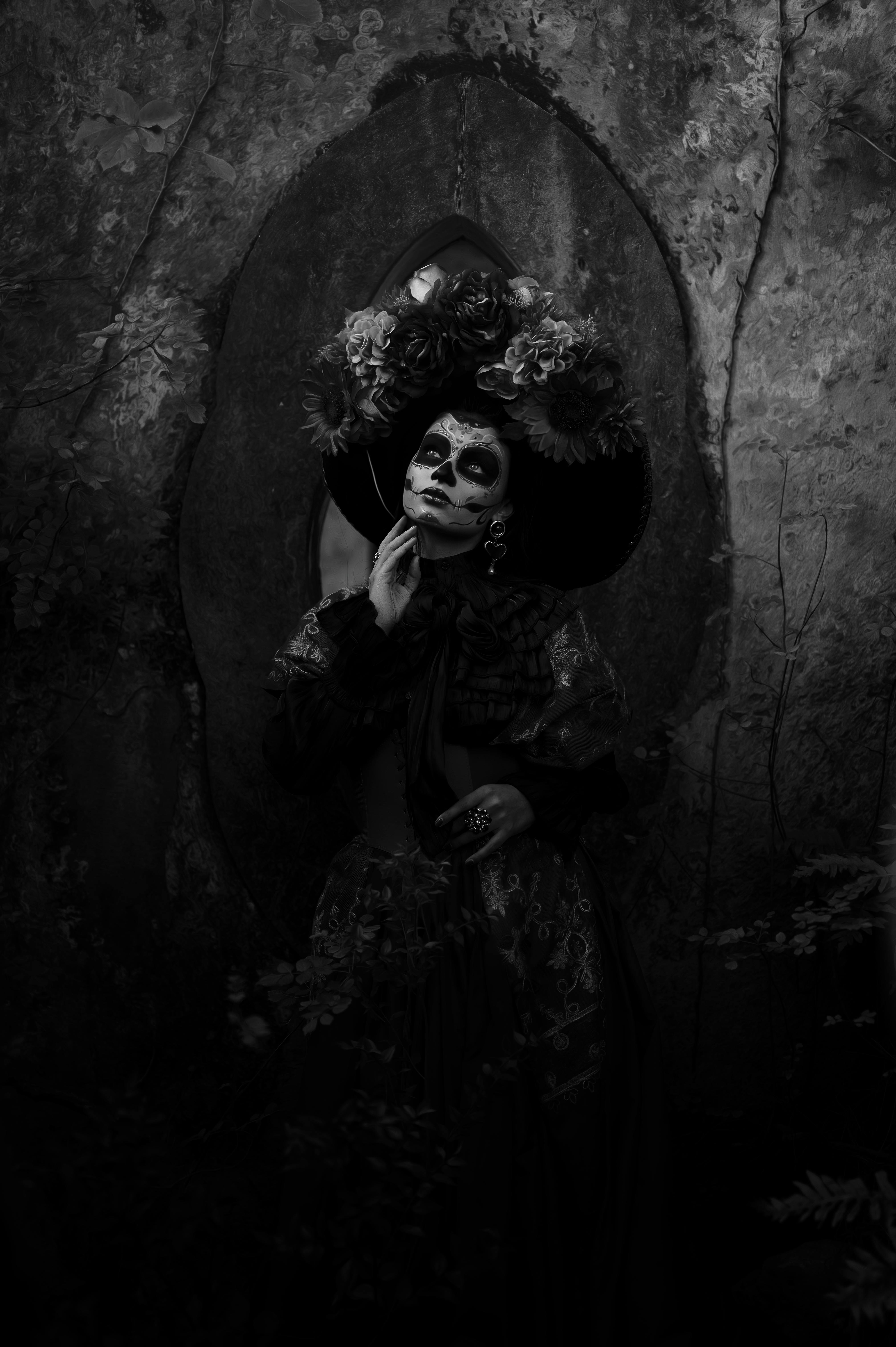 woman in tradicional calavera catrina costume and makeup