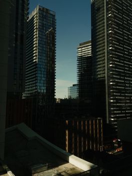 Captivating view of Toronto's skyline featuring modern skyscrapers under a clear blue sky.