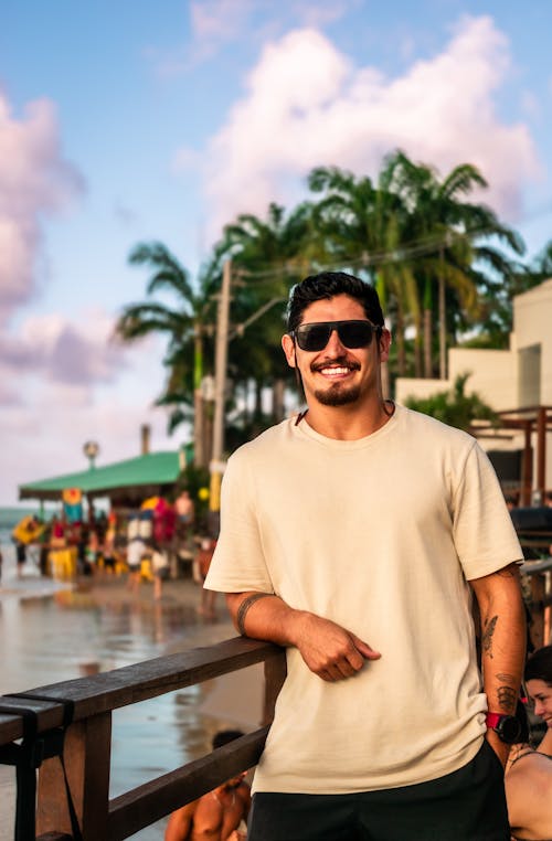 Smiling Man in Sunglasses and T-shirt