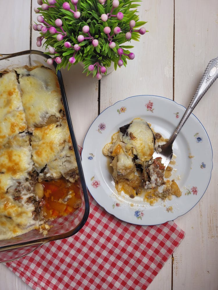 Flowers And Food In Plate And Glass Box