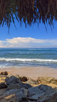 Serene beach scene with ocean waves in Colombo, Sri Lanka, perfect for a summer travel vibe.