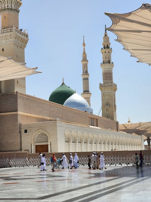 People Walking in the Mosque of the Prophet Square in Medina