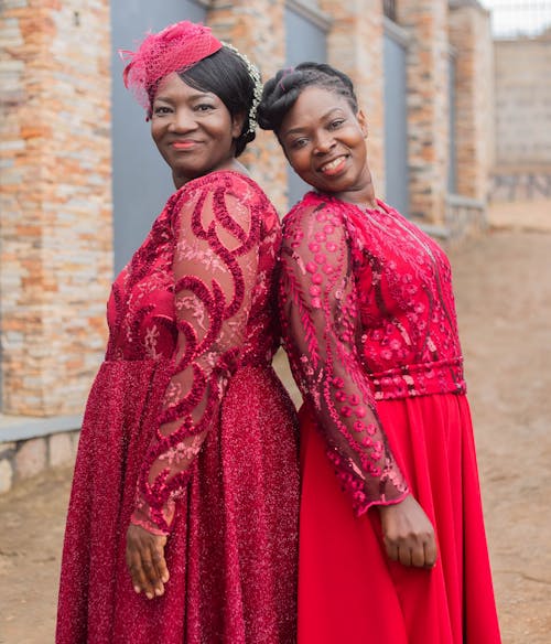 Women Wearing Elegant Pink Dresses