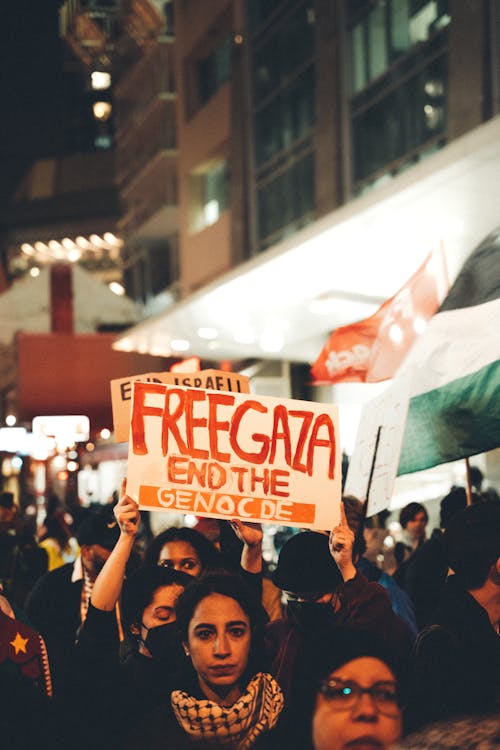 Crowd Protesting for Palestine at Night