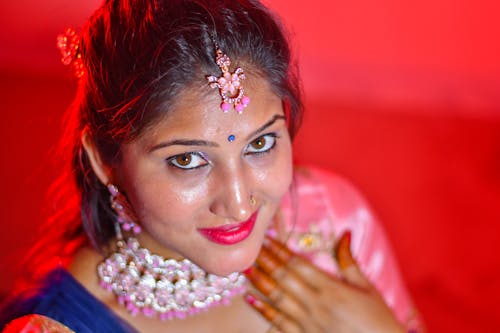 Photo of a Bride in Traditional Clothes and Jewelry 