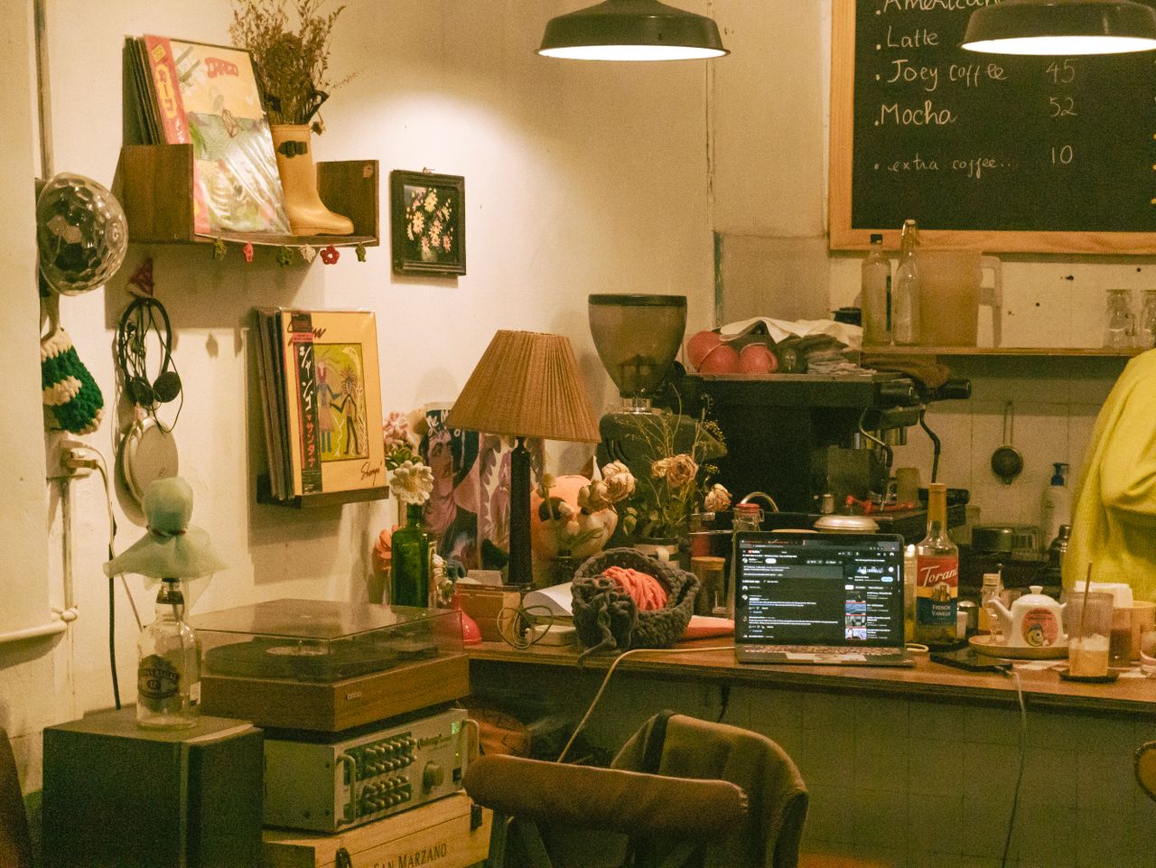 warm and inviting retro caf interior featuring vintage decor books and