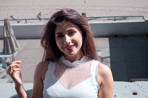 Free Smiling Brunette Wearing Pink Lipstick Stock Photo