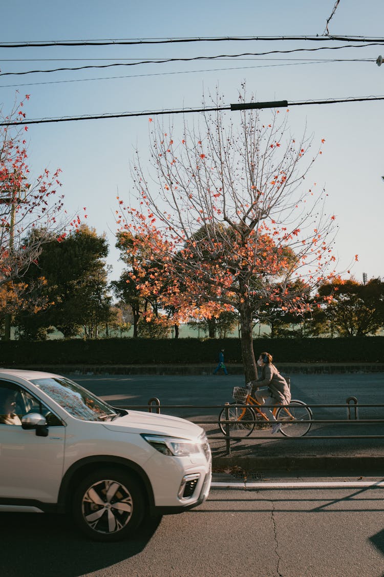 A Car Is Parked On The Side Of The Road