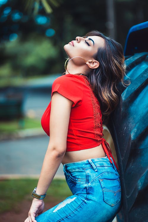 Free Woman With Red Skirt and Blue Denim Jeans Stock Photo