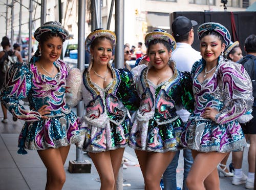 Pretty Dancers in Dresses Posing on Street