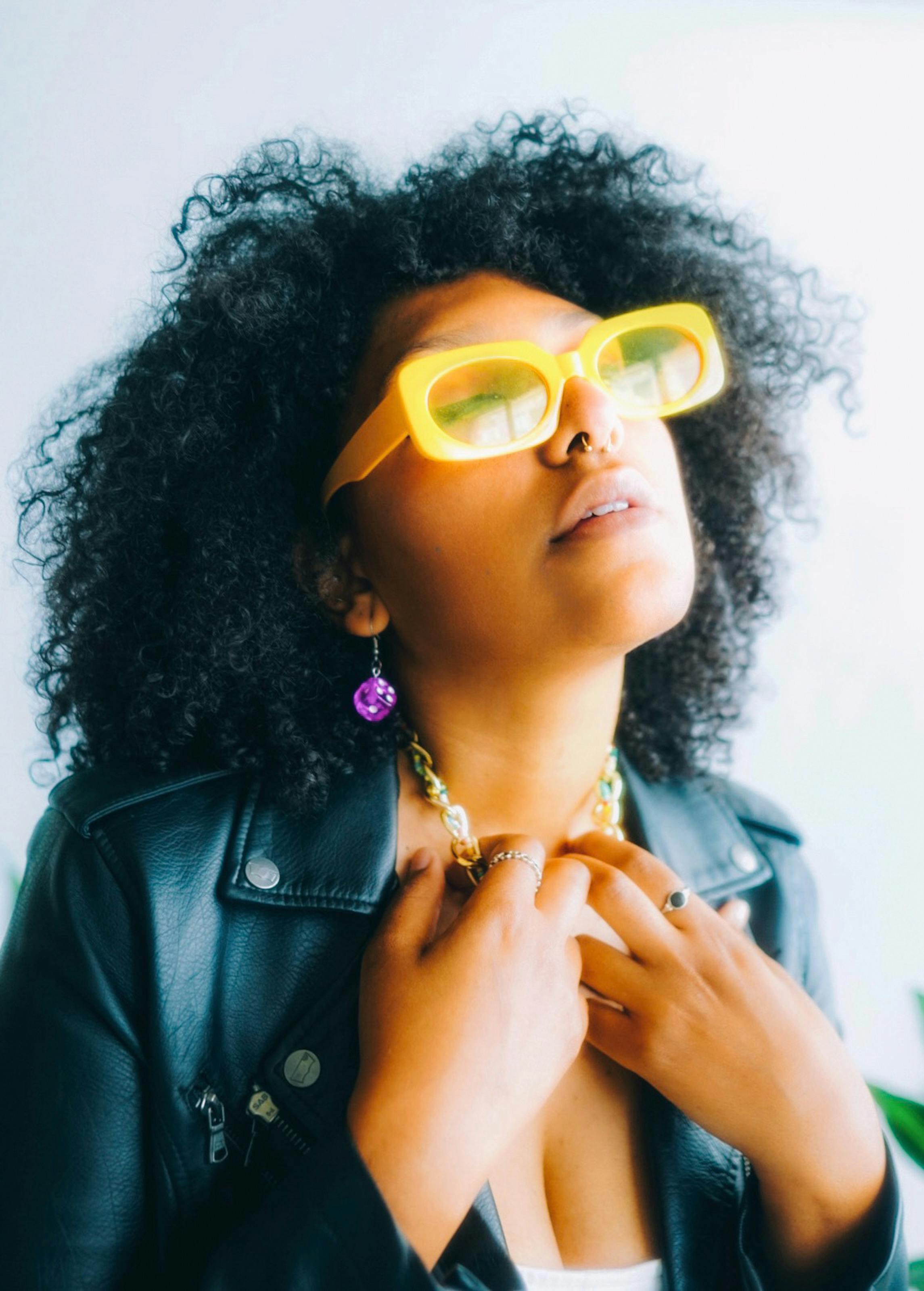 girl with yellow sunglasses