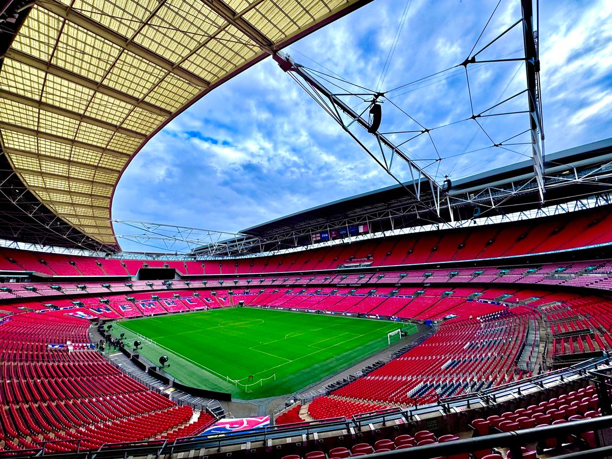Wembley Stadium in London with no people in the frame, an illustrative real photo of an English football ground, chosen for the Ted Lasso Season 4 finale