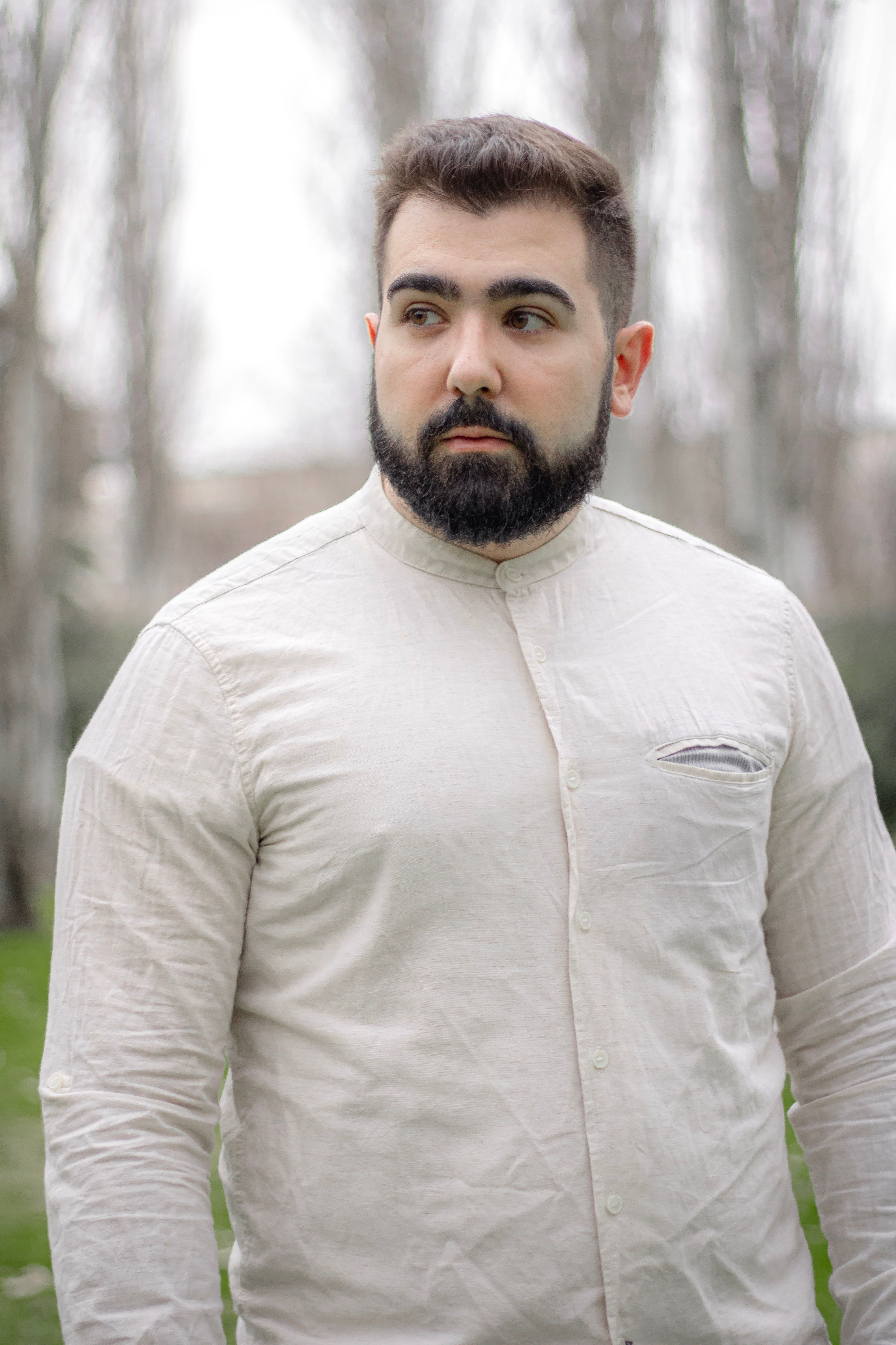 Young Man in a White Shirt · Free Stock Photo