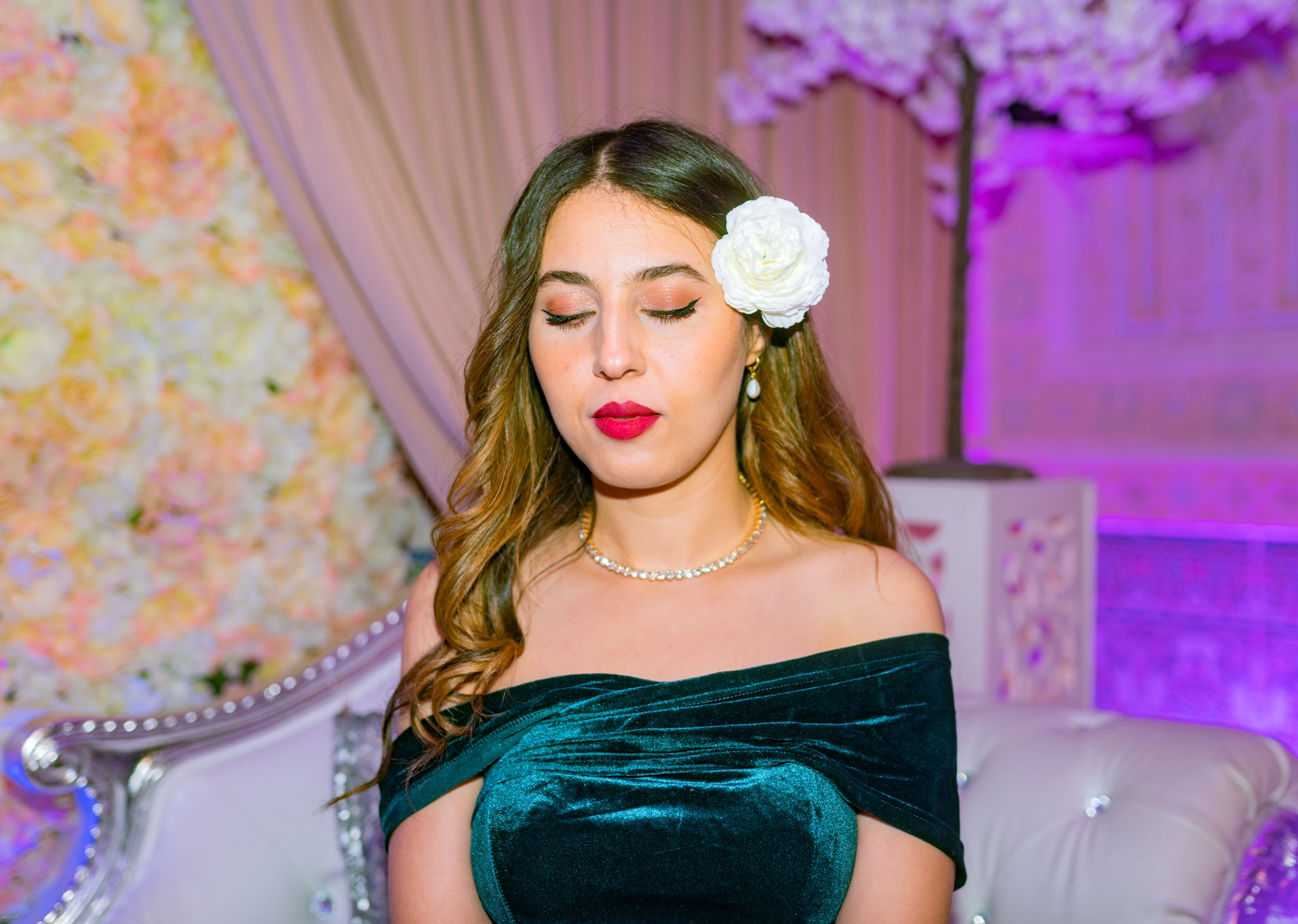 Woman with Flower in Hair and with Eyes Closed · Free Stock Photo