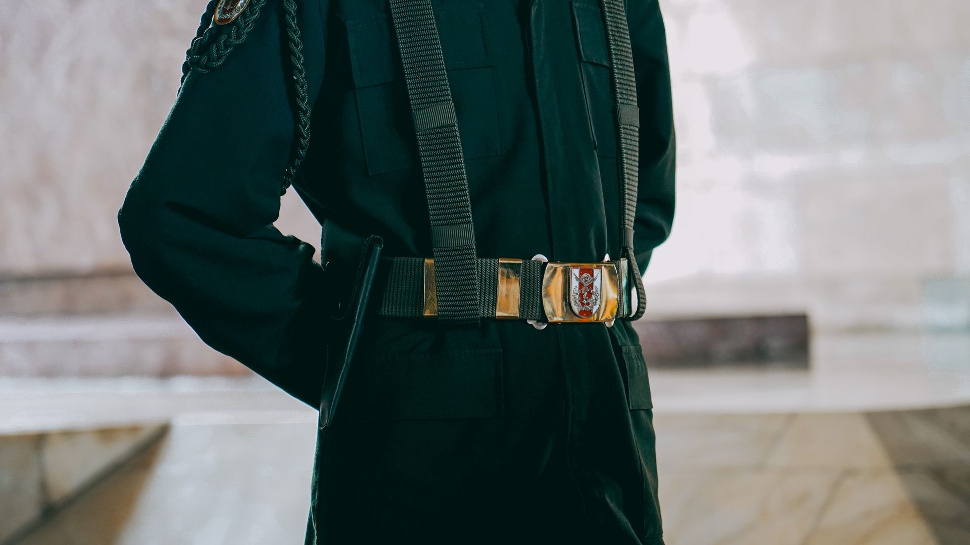 Modafinil for Security Guards: Enhancing Vigilance Detail of honor guard uniform in Ankara, showcasing the unique belt buckle and military design — modafinil for security guards