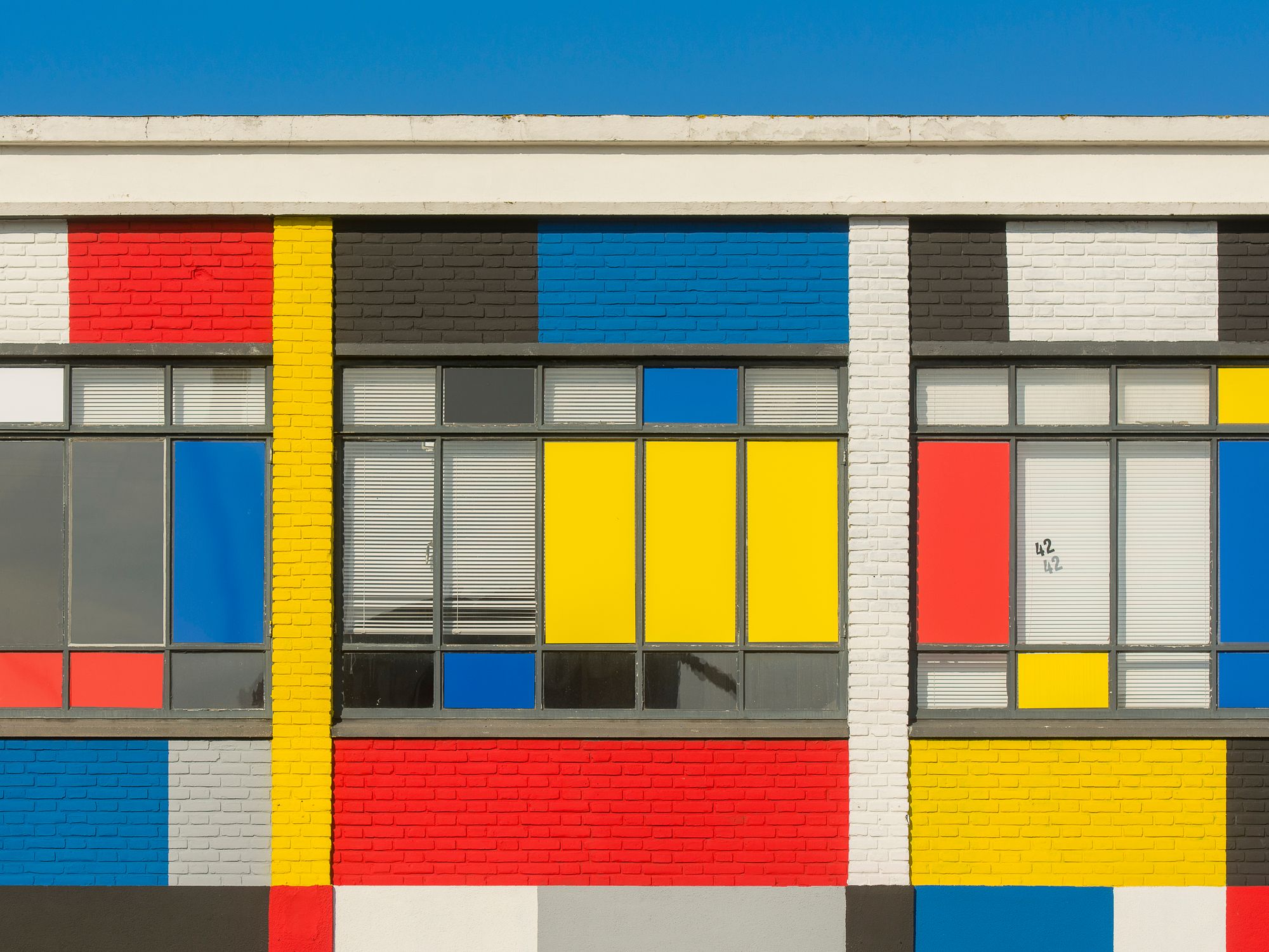 Masonry and Render Painting in Tooting, Wandsworth — professional painter and decorator at work