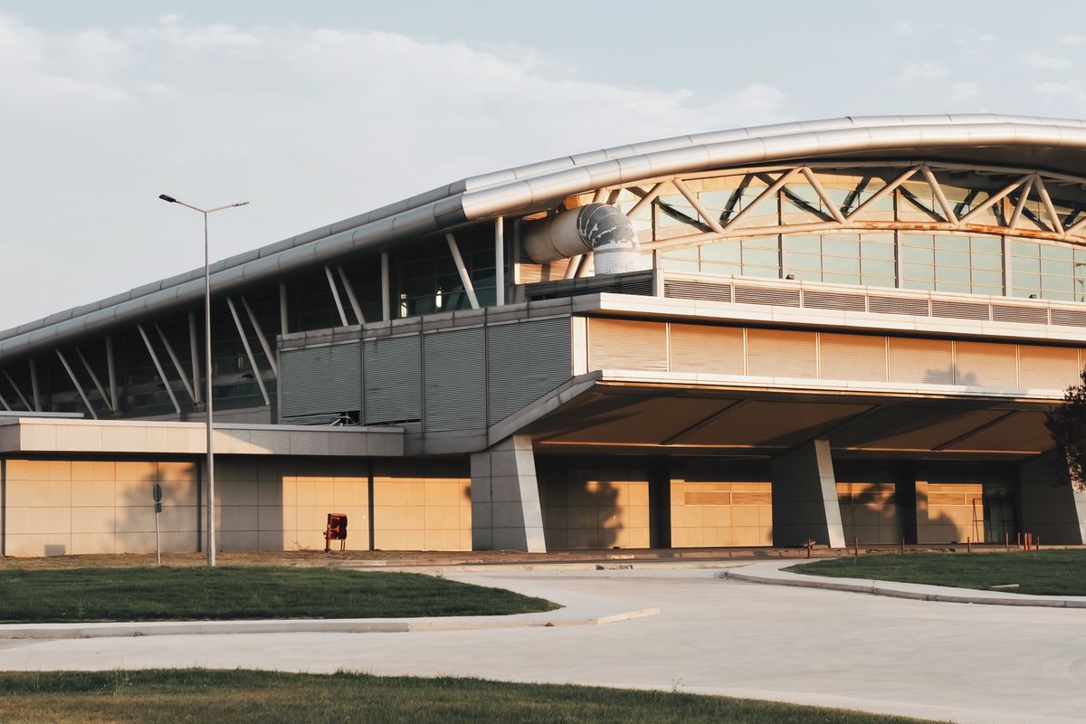 Airport terminal exterior with the arrivals entrance
