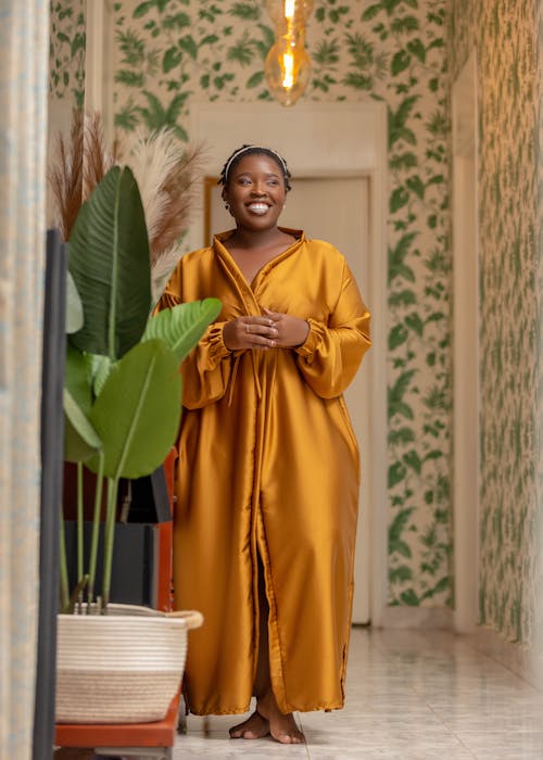 African Woman Wearing Golden Dress 