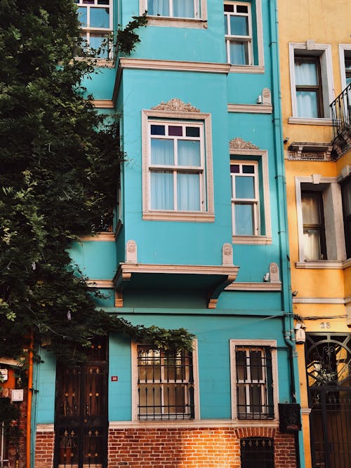 Facade of a Turquoise Colored Townhouse