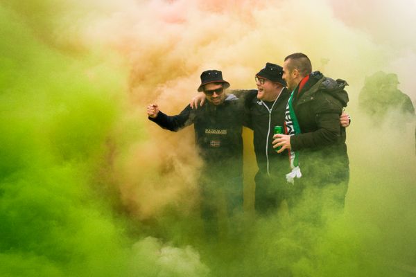 Smoke flares and fans celebrating in Budapest