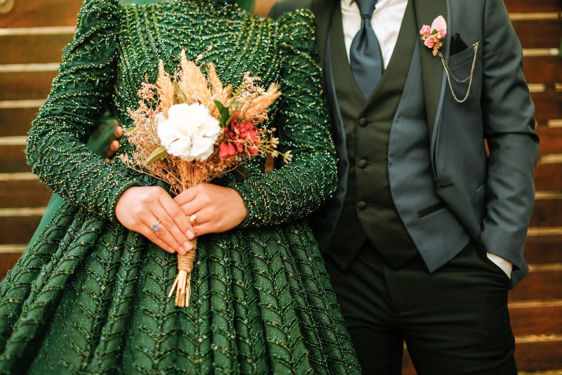 Bride in a Green Wedding Dress and the Groom Standing Close Free Stock Photo Bride in a Green Wedding Dress and the Groom Standing Close Free Stock Photo