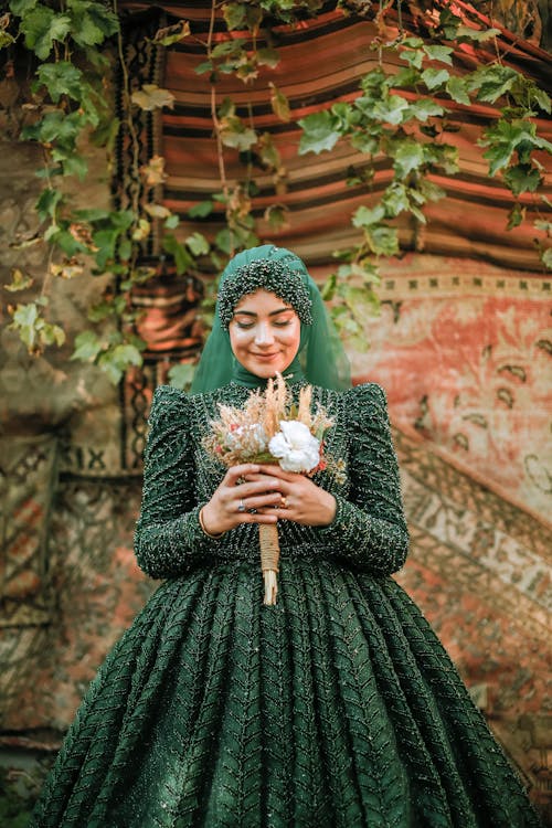 Smiling Bride in Traditional, Green Dress
