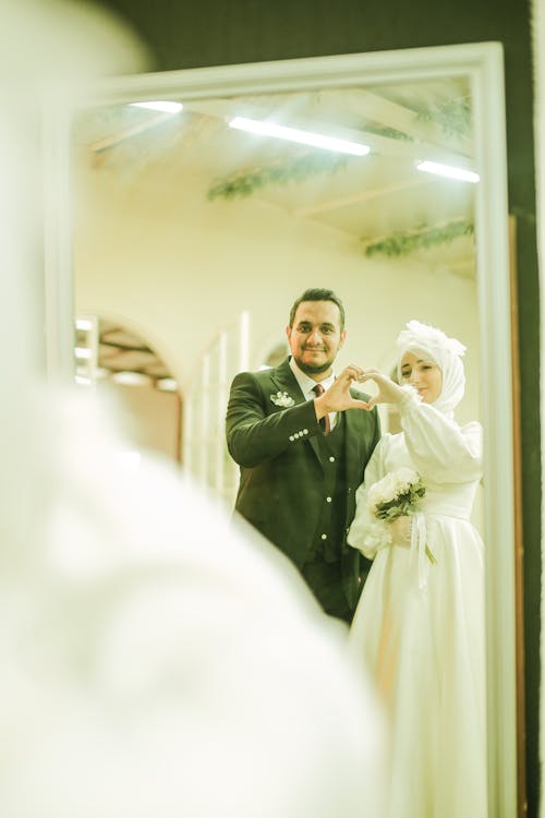 Elegant Bride and Groom Reflecting in a Mirror