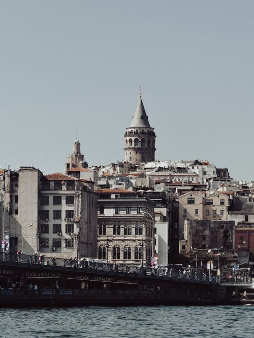 Free Stunning view of Galata Tower amidst Istanbul's urban landscape, showcasing Turkey's rich architecture. Stock Photo