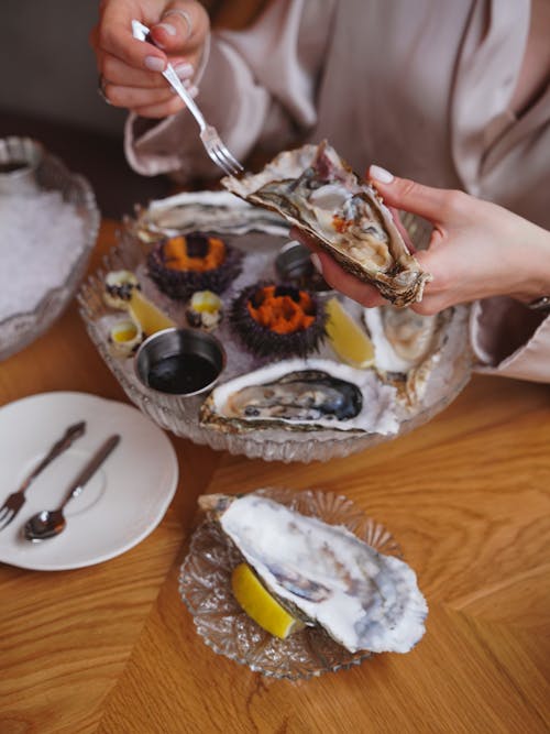 Woman Eating Seafood 