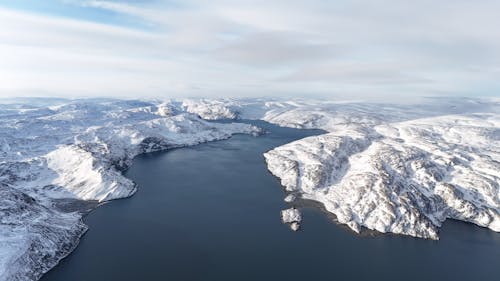 Hills in Snow around Lake